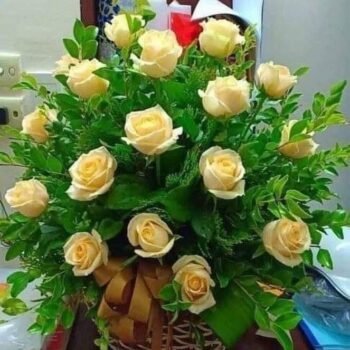 Yellow rose flower basket